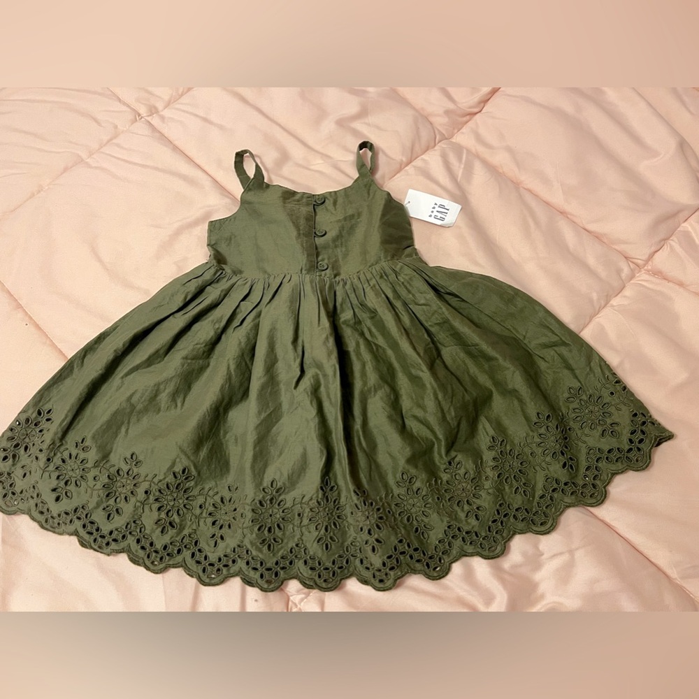 Green BabyGAP dress with eyelet detail